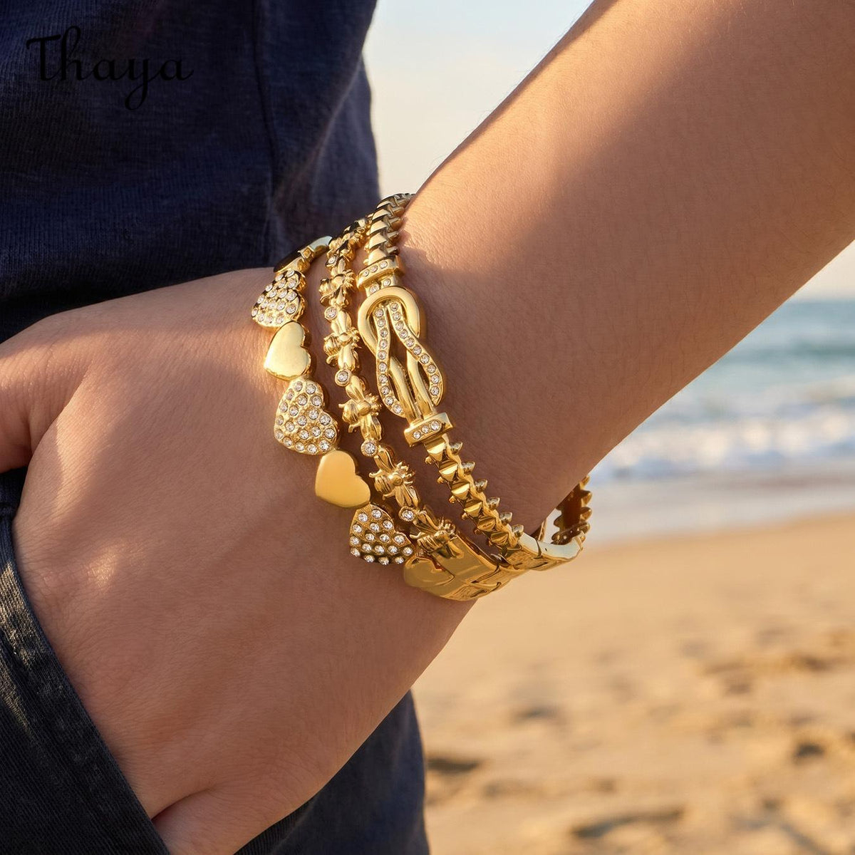 Thaya Elegant Gold-Tone Stackable Charm Bracelet Collection