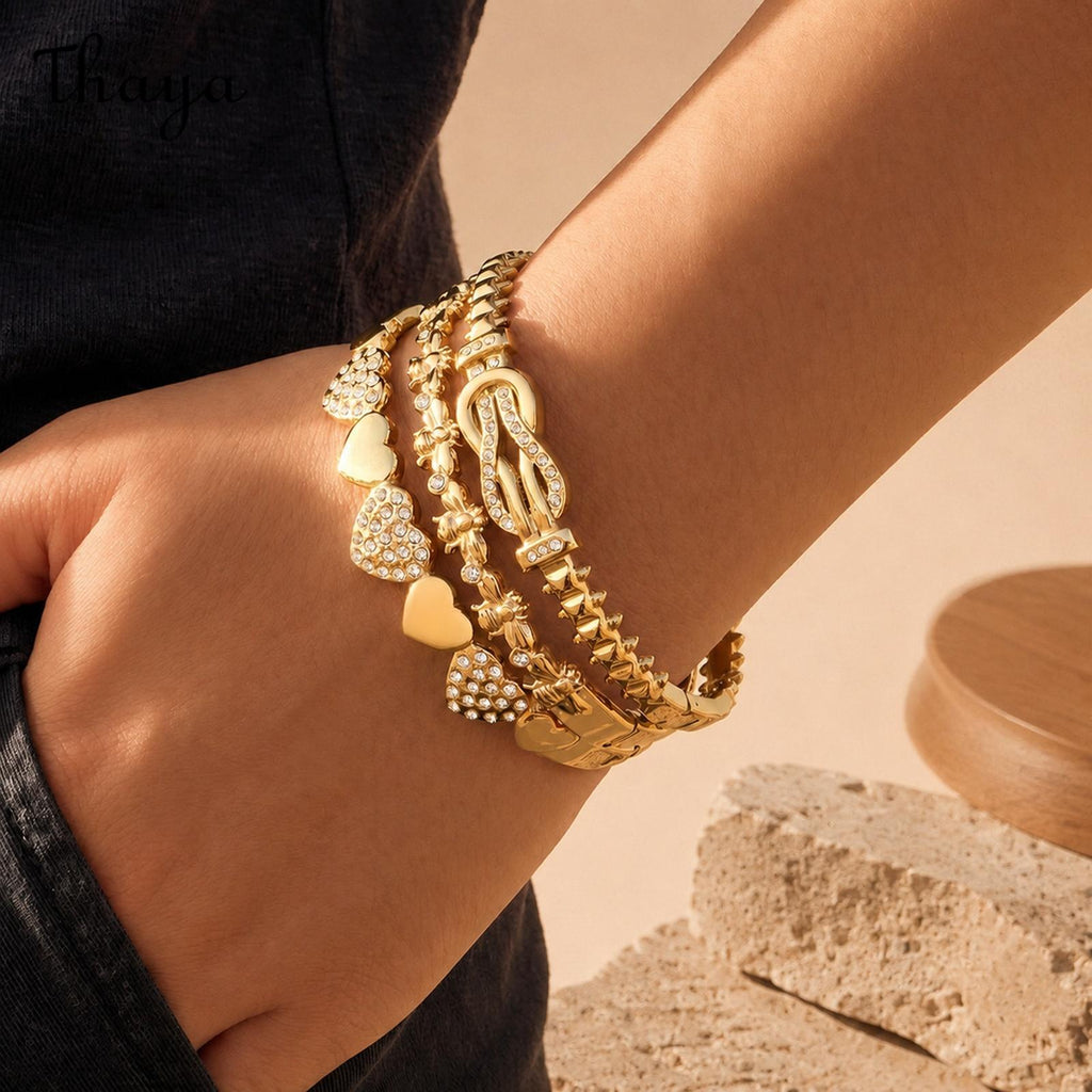 Thaya Elegant Gold-Tone Stackable Charm Bracelet Collection