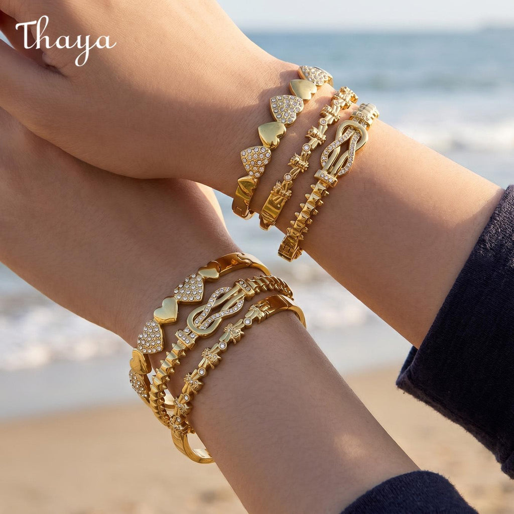 Thaya Elegant Gold-Tone Stackable Charm Bracelet Collection