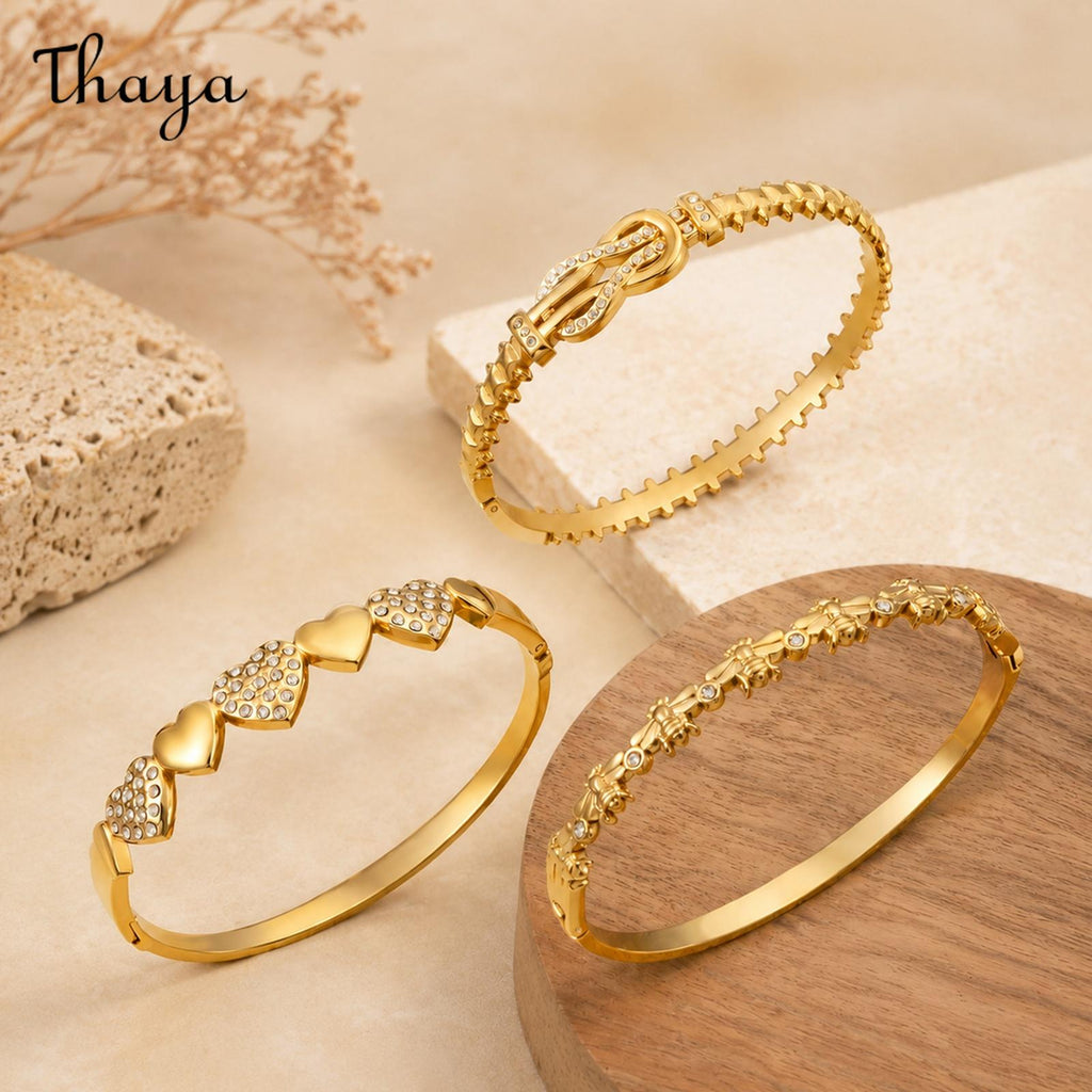 Thaya Elegant Gold-Tone Stackable Charm Bracelet Collection